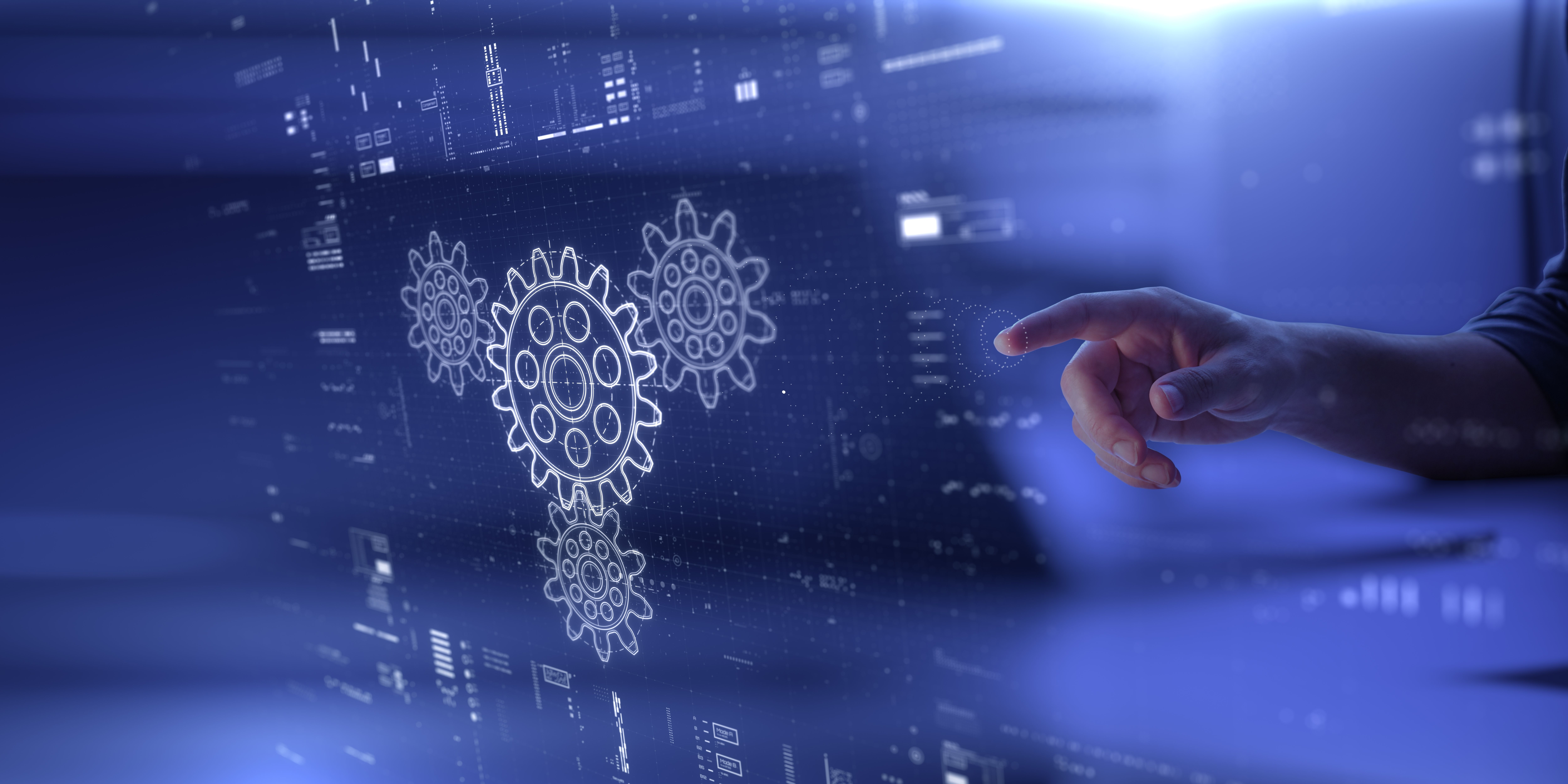 A man's hand is pressing holographic gears that represent Usenet search processing.