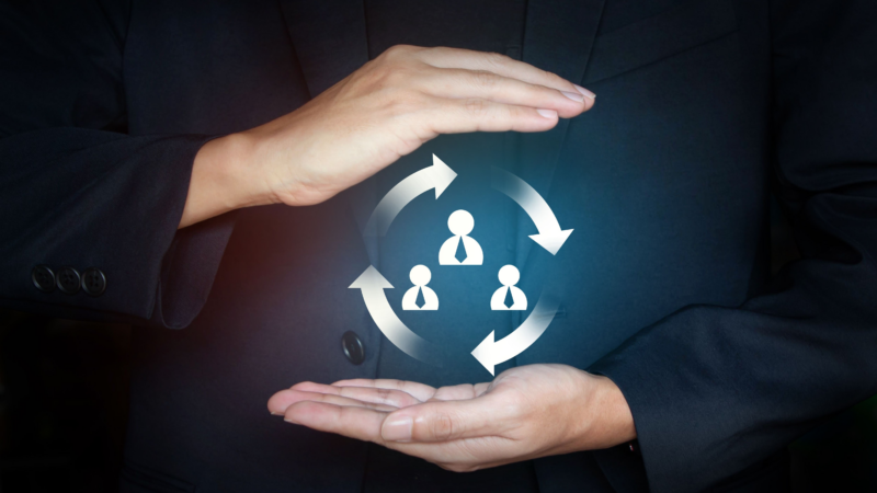Two disembodied hands hold a ball made of light between them with three icons in the shape of simple human figures that represent the posts stored with Usenet retention.